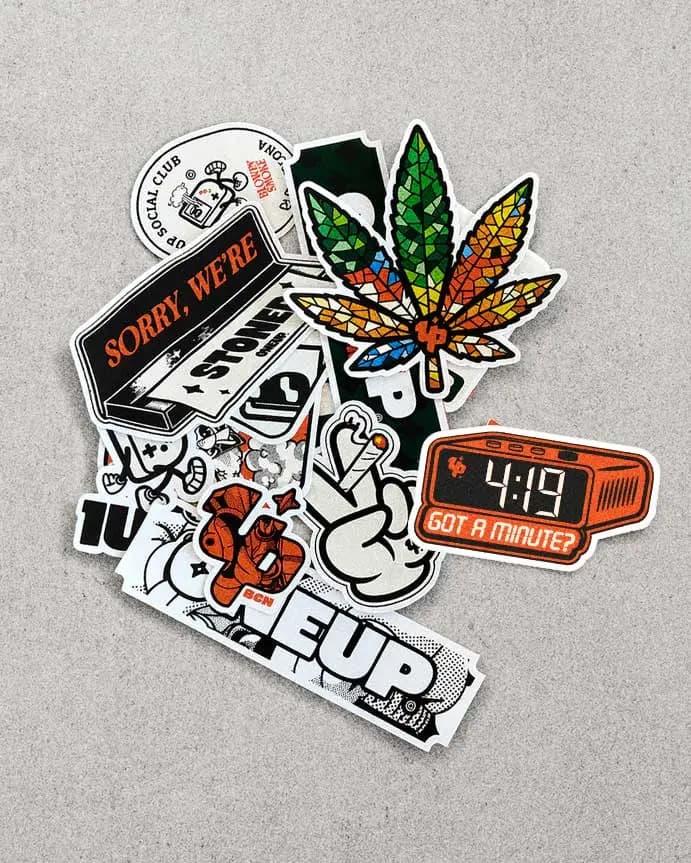1UP sticker pack featuring Barcelona cannabis social club logo designs